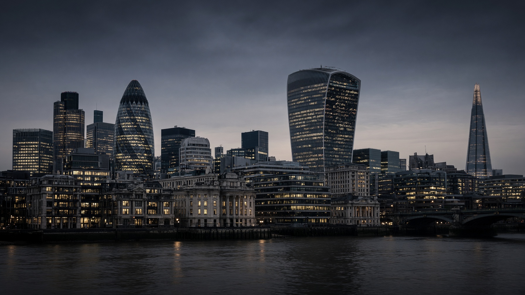 City of London skyline at dusk, viewed across the Thames